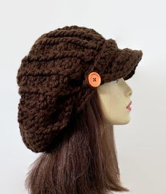 This is made to order. This hat is crocheted with chunky brown acrylic yarn and is washable. I can make this in a variety of different colors so please contact me if you would like this in another color. Brown Crochet Hat One Size, Brown Acrylic Hats One Size Fits Most, Brown Brimmed Crochet Hat One Size, Brimmed Brown Crochet Hat For Fall, Brown Crochet Cap Hat, Brown Slouchy Hand-knitted Crochet Hat, Slouchy Brown Hand-knitted Crochet Hat, Slouchy Hand-knitted Brown Crochet Hat, Brown Slouchy Handmade Crochet Hat