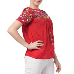 Raj Roshni Embroidered Blouse From the sea to the shore and all the places in between. This blouse resonates in a season that's full of swelter. Top it over shorts and skirt for impeccable chic and ease. Bohemian Red Blouse With Relaxed Fit, Folk Style Embroidered Beach Tops, Bohemian Red Blouse Relaxed Fit, Red Embroidered Top With Embroidered Hem, Red Floral Embroidered Top, Summer Beach Embroidered Top With Hem Detail, Summer Beach Top With Embroidered Hem, Multicolor Embroidered Tops For Beach, Multicolor Embroidered Hem Top For Beach