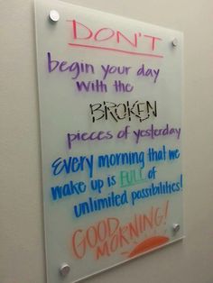 a sign on the wall that says don't begin your day with the broken pieces of yesterday