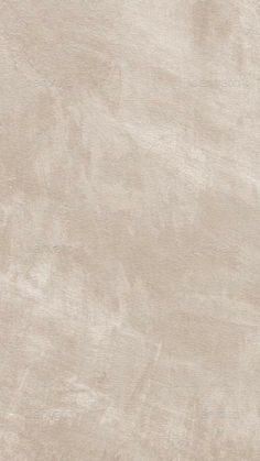 an image of a beige wallpaper textured with light brown paint on the walls