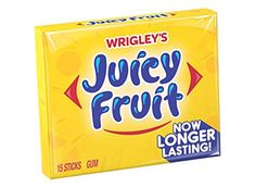 a box of juicy fruit gum sitting on top of a couch