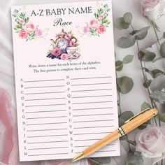 a baby name game with flowers and a pen