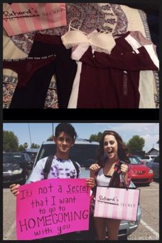 two people holding signs in front of a car