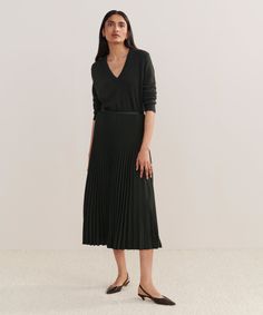 Pleated Skirt Forest Dressed up or down with ease, this pleated matte skirt is perfect for any occasion. With an easy, ultra-flattering drape, this piece is meant for styling with varied silhouettes: pair it with a relaxed knit or turtleneck for an elevated look or a slim-fit tee for more casual styling. | Jenni Kayne Women's Pleated Skirt Size X-Small Midi Dress With Pleated Skirt, Evening Midi Skirt With Pleated Hem, Evening Pleated Waist Midi Skirt, Flowy Midi Dress With Pleated Skirt, Evening Tiered Skirt With Pleated Waist, Evening Pleated Skirt With Relaxed Fit, Flowy Flared Skirt Dress For Work, Chic Pleated Skirt Dress, Formal Dresses With Relaxed Fit Skirt