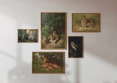 several paintings on the wall with animals in them