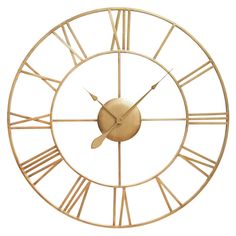 a golden clock with roman numerals on it's face is shown against a white background