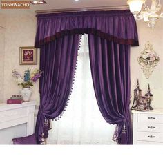 a bedroom with purple drapes and curtains on the windowsill, along with white dressers