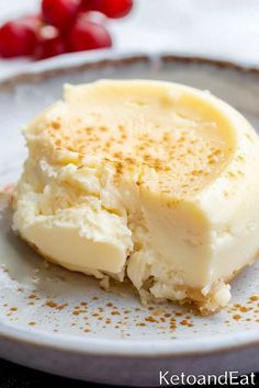 a piece of cheesecake sitting on top of a white plate