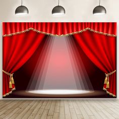 an empty stage with red curtains and lights