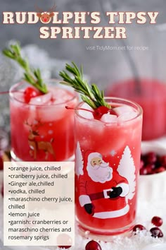 two glasses filled with cranberry punch and topped with rosemary garnish