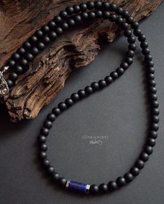 Minimalist necklace with 6 mm matte black onyx beads, hexagonal silver hematite beads and a small lapis lazuli roller. Strung on sturdy stainless steel wire with a stainless steel snap fastener Gratitude Ideas, Jewelry Stones, Necklace Men, Hematite Beads, Stainless Steel Wire, Minimalist Necklace