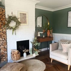 a living room filled with furniture and a fire place