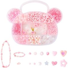 a pink bag filled with lots of different types of candies and other things to put in it