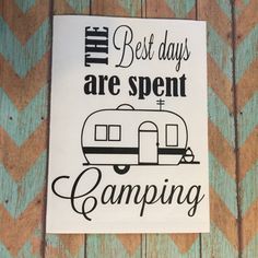 the best days are spent camping sticker on a wooden background with chevron wood planks