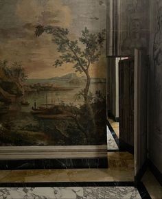 a painting on the wall in a room with marble flooring and walls that have paintings on them