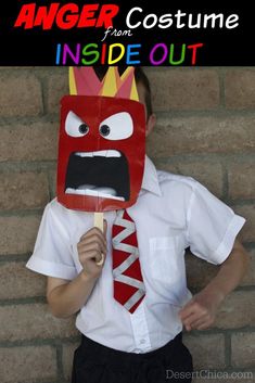 a young boy wearing a red mask and tie with the words anger costume inside out