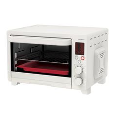 a white toaster oven with the door open and red trays in front of it