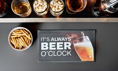 there is a sign that says it's always beer o'clock