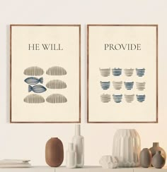 two framed art prints on the wall above a table with vases and other items