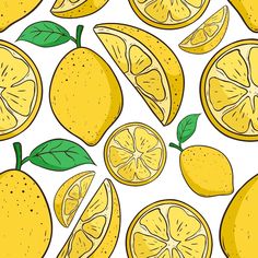 a bunch of lemons with green leaves and slices cut in half on a white background