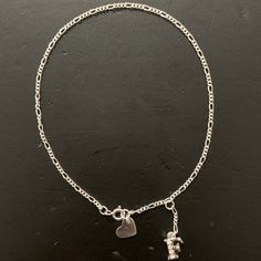 Nwot Sterling Silver Cubic Zirconia Initial “F” And Heart Charm Anklet Bracelet Perfect For Summer Super Cool And Stylish Adds A Flair To Any Outfit Weighs 1.7 Grams Marked .925 Sterling Silver Approximate Measurements: Anklet 9"L X 1/8"W, Plus 1"L Extender; Initial Charm 1/2"L X 1/4"W; Heart Charm 1/4"L X 3/8”W. Can Be Worn 9” Connected At The Letter Or 10” At The Heart As Seen In Photo. Price Is For One Anklet Only. Check Out My Shop For Other Initials Available In My In The Letter A, D, F, G, Initial F, Fossil Bracelet, Gold Leaf Necklace, Charm Anklet, The Letter A, Gold Bead Necklace, D F, Metal Heart, Antique Necklace