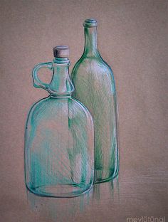 two green glass bottles sitting next to each other on top of a brown paper background