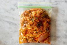 a bag of food sitting on top of a marble counter