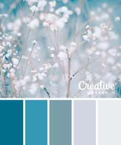 the color scheme is blue and gray with some white flowers in it, including baby's breath