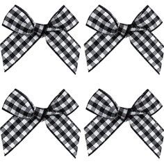 four black and white gingham bows with one large bow on each side,