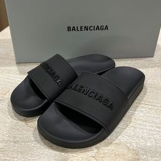 Balenciaga Women Pool Slides Brand New With Box And Dust Bag Currently Selling At Stores For $395 Plus Tax Size 35 Synthetic Upper/Lining Made In Italy 3/4” Heel 3/8” Platform Balcienga Shoes, Balenciaga Slippers, Cheap Non-slip Slides For Streetwear, Black Slides With Textured Footbed For Streetwear, Balenciaga Slides, Black Slip-on Slides For Streetwear, Balenciaga Fur Slides, Designer Slides, Shoes Balenciaga