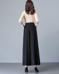 * A simple wide leg pants for winter, made of quality wool blends. * Two pockets, they are big enough for Iphone and your hands. * Fixed waist with zipper and button. * Material: 50% wool, 50% polyester; lining-100% polyester * Washing instructions: Dry Clean Only * Let us know your usual size in your country and your overall height. * Can custom make waist size and length. * Size: True to US size, US 0-US 20 are available, you can let us know your usual size and height in your order. * Shipping Black Full-length Bottoms For Winter, Black Full Length Bottoms For Winter, Black Full Length Dress Pants For Winter, Winter Solid Full-length Bottoms, Black Wide-leg Dress Pants With Loosely Fitted Hips, Black Wide Leg Dress Pants With Pockets, Black Full-length Dress Pants For Fall, Elegant Ankle-length Winter Bottoms, Winter Workwear Full Length Pants