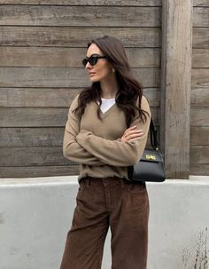 The 7 Biggest Basics Trends of 2024 | Who What Wear Striped V Neck Sweater Outfit, Who What Wear 2024, V Neck Sweater With Shirt Underneath, Sweater Trends 2024, Oversized V Neck Sweater Outfit, V Neck Sweater Outfit Aesthetic, Ribbed Sweater Outfit, Tan Skin Outfit, Vneck Sweater Outfit