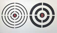 two circles with the letters a and b are shown in black and white, as well as an arrow