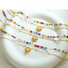 Style: Female Material: Titanium Steel, Imitation Pearl, Crystal Beads Pearl Type: Uncultured Pearl Color: White Necklace Length: 40 / 46)+5cm Heart Pendant:1.3*1.5cm Gold Heart Pendant, Stacked Necklaces, Heart Pendant Gold, Rainbow Crystal, Pearl Crystal, White Necklace, Pearl Types, Layered Necklace, Pearl Color