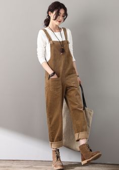 "The womens classic corduroy overalls with baggy straight leg fit. Traditional style with two pockets in front. ★★Feature 60% Cotton, Corduroy Medium Weight，Comfortable, Breathable Suit for Spring,Autumn, Winter Fabric swatch https://etsy.me/3rDEGCJ Size Chart https://etsy.me/3skS1Aq More Overalls /Jumpsuits From Ylistyle https://etsy.me/3B2exkH ★★ Model size Height approx 170 cm (5′ 7″) Bust 84 cm (33\") Waist 66 cm (26\") waist. She wears size XS ★★Bespoke Order Service If you Request other co Custom Jumpsuit, Brown Overalls, Long Wool Coat Women, Overalls Outfits, Retro Trousers, Womens Overalls, Green Wool Coat, Overalls Casual, Fall Family Photo Outfits