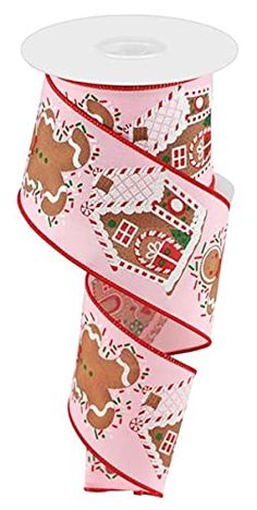 a roll of pink christmas ribbon with gingerbreads on it