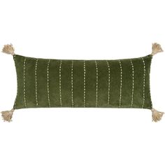 a green and white striped pillow with tassels