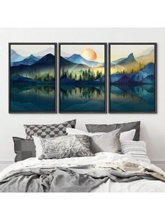 two paintings hanging on the wall above a bed