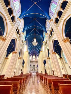 the inside of a church with high vaulted ceilings