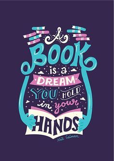 a book is a dream, you hold in your hands hand drawn lettering on a purple background