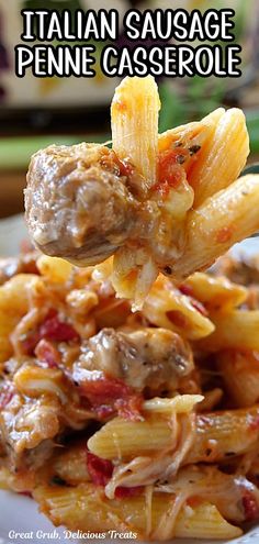 A bite of Italian Sausage Penne Casserole on a fork. Sweet Italian Sausage Dinner Ideas, Ground Hot Italian Sausage Recipes For Dinner, Pasta Salad With Italian Sausage, What To Make With Hot Italian Sausage, Recipe With Hot Italian Sausage, What To Make With Hot Sausage, Hot Sausage Crockpot Recipes, Sweet Italian Sausage Recipes Dinners Pasta, What To Make With Sweet Italian Sausage