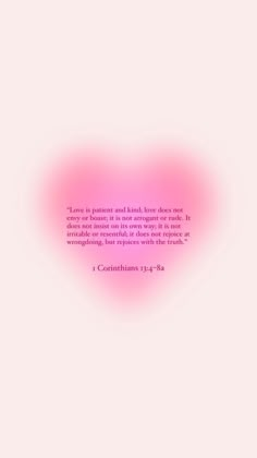 a pink heart with a bible verse on it