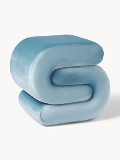 two blue pillows stacked on top of each other