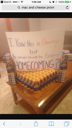 a bunch of boxes sitting on top of a table next to a sign that says, i know this is cheesy but the answer should be easy