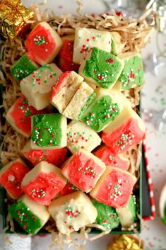 a box filled with lots of different types of food on top of a white table