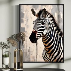 a zebra standing in front of a painting on the wall next to a vase and plant