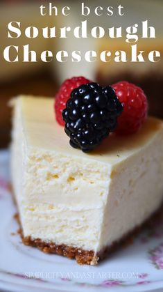 the best sourdough cheesecake with raspberries and blackberries on top