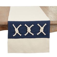 a table runner with two crosses on it