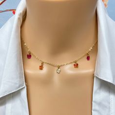 Transcend into beauty with this unique, handcrafted butterfly choker necklace, a symbol of hope and inner growth. Our cute and trendy Fuchsia Pink Orange Butterfly Choker Necklace on 14K gold chain adorned with Swarovski crystal butterflies sparkle in the light and is ready to match any outfit for any occasion. Makes a great gift for someone special. 14k gold chain 14k gold lobster clasp Swarovski crystal butterflies necklace lengths 16 & 18 inch custom size necklaces available great jewelry gif Butterfly Choker Necklace, Crystal Butterflies, Butterfly Choker, Inner Growth, Orange Butterfly, Orange Crystals, Crystal Butterfly, 14k Gold Necklace, Chain Extenders