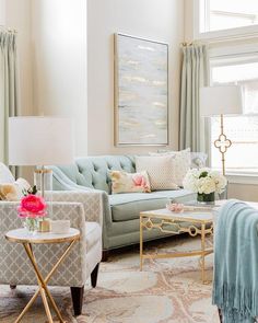 a living room filled with furniture and flowers